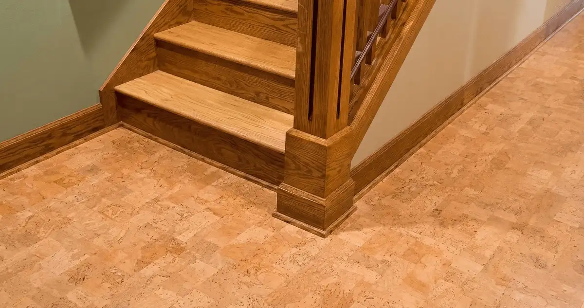 End of a staircase with cork flooring in Houston, TX