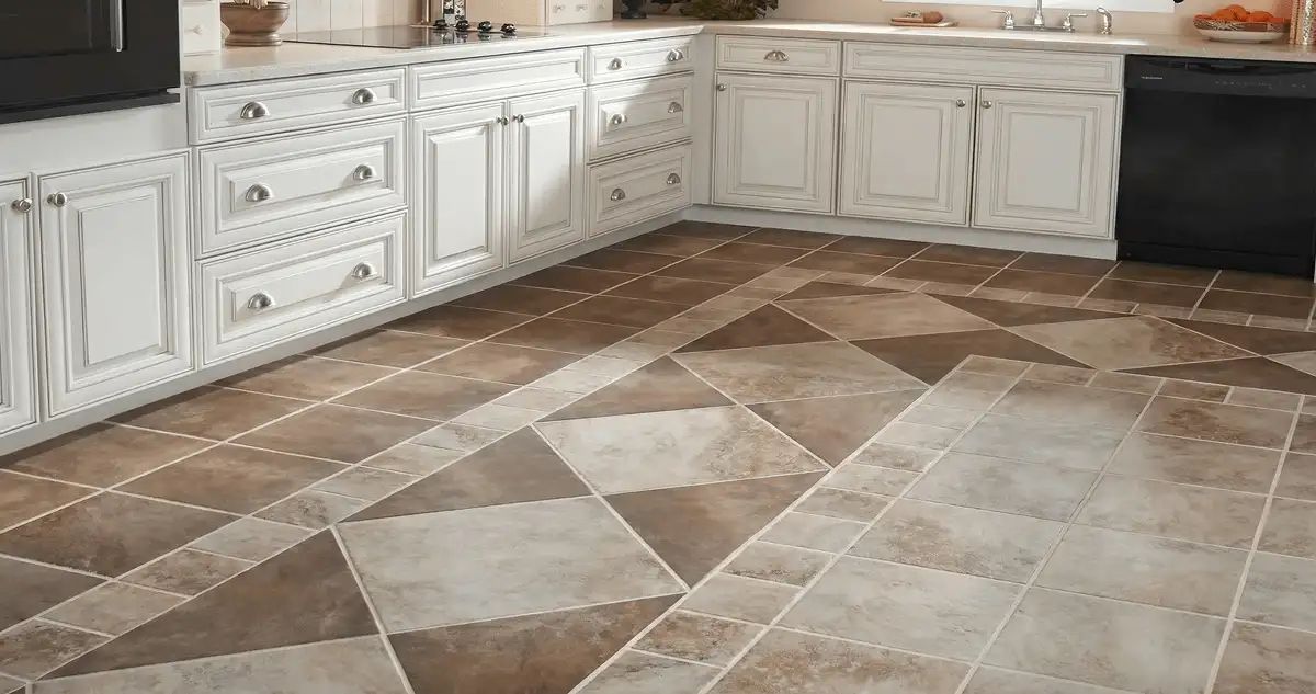 Kitchen with white cabinets and a professionally installed tile floor in Houston, TX